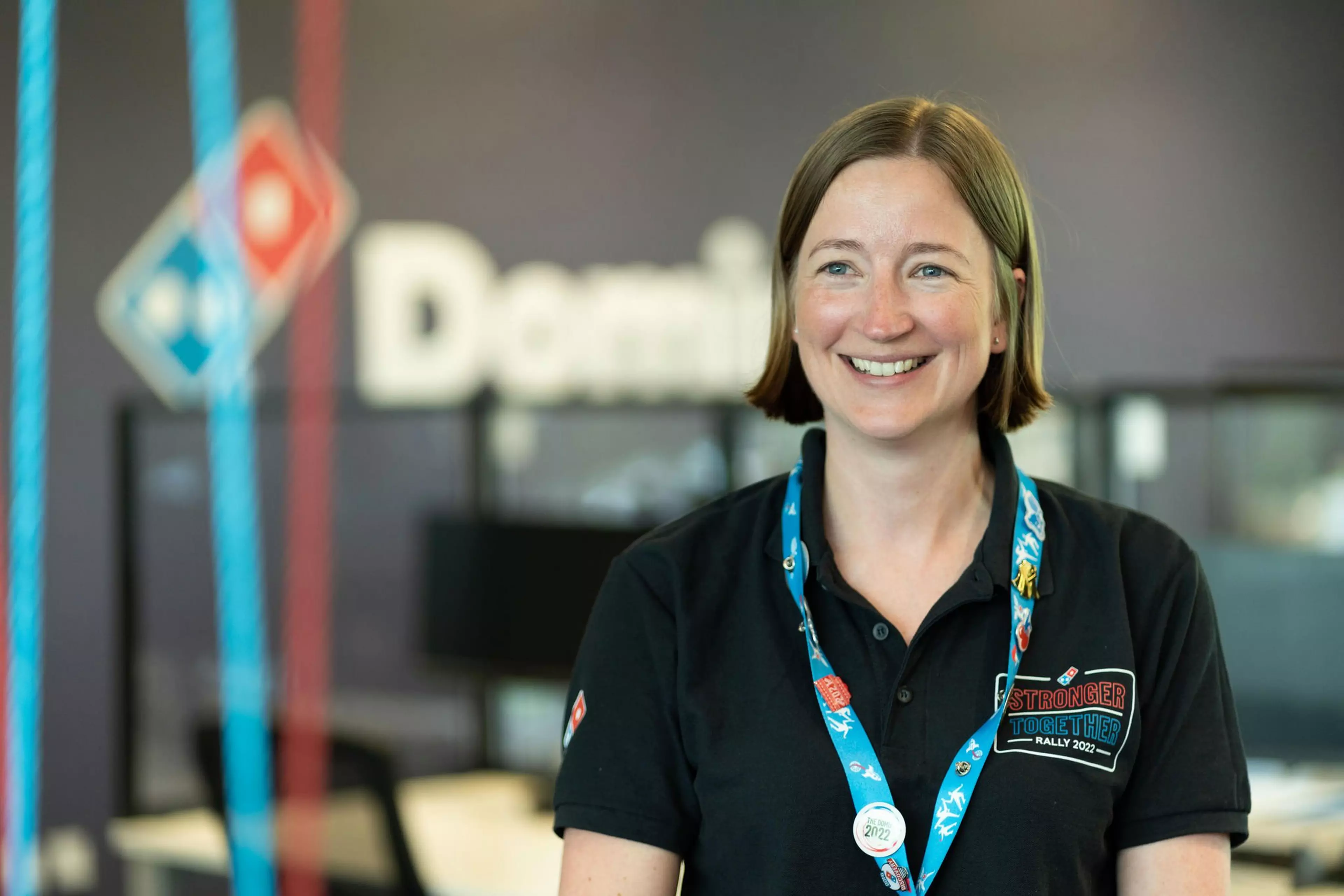 Dominos support worker smiling