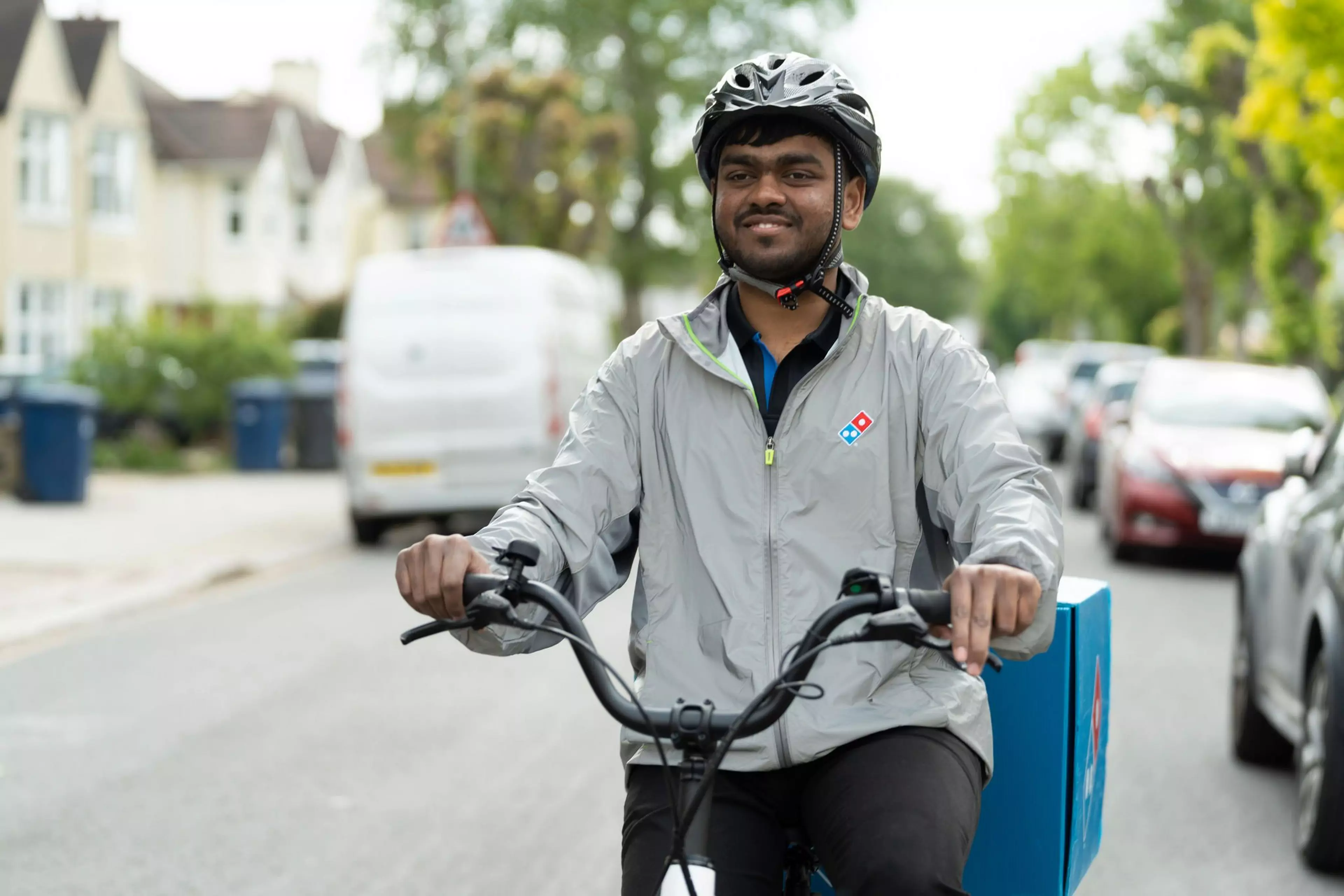 Delivery driver on bike