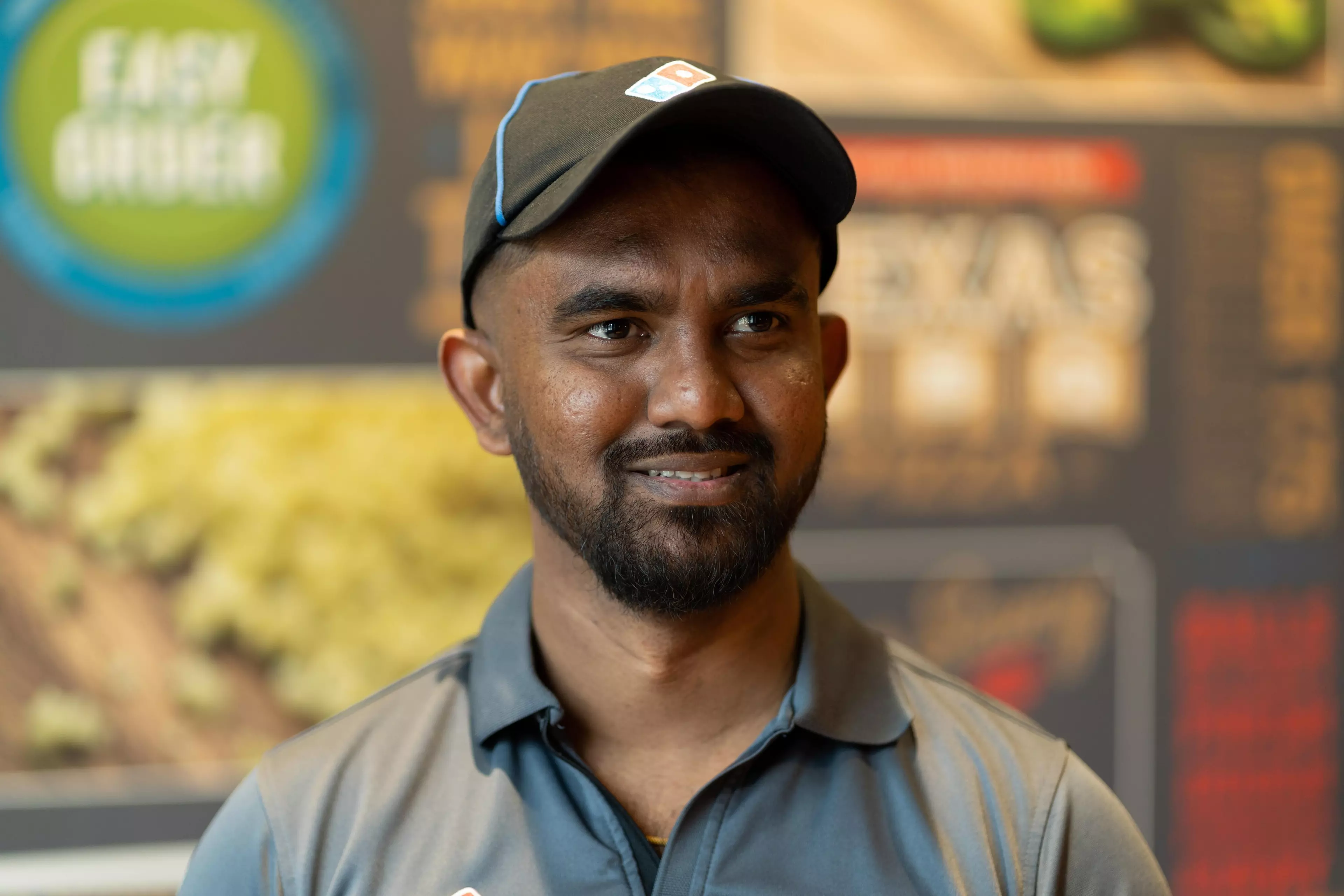 Portrait of Dominos staff member